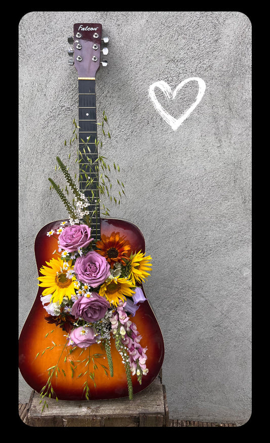 guitar with flowers