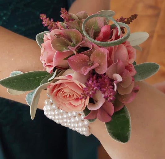 Vintage Pink Debs Corsage featuring soft pink flowers and greenery, crafted with timeless elegance and handmade in Lusk, Ireland