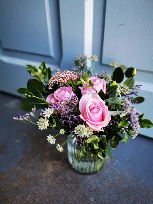 Jar of fresh roses arranged simply and beautifully, perfect for gifting or personal enjoyment, handcrafted in Lusk, Ireland.