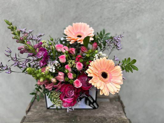an envelope bursting with flowers