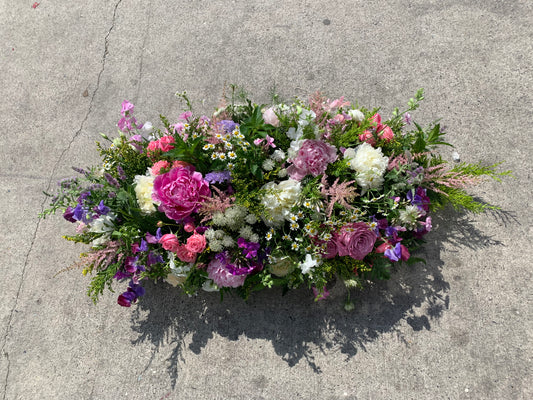 wild casket spray