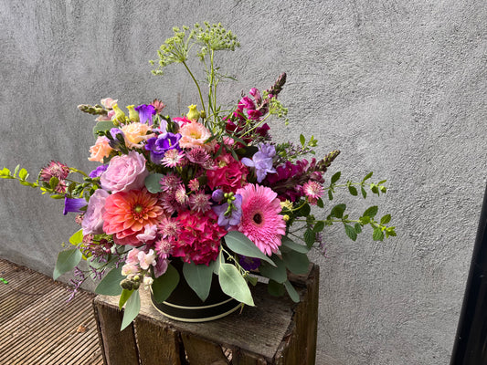 Hat box of flowers